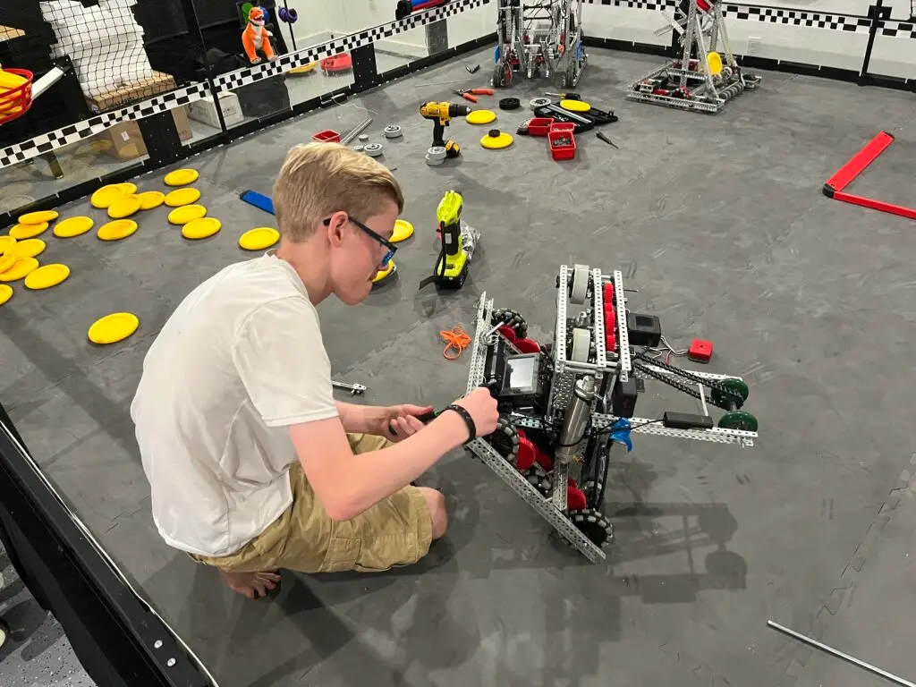 Chase working on a Vex robot